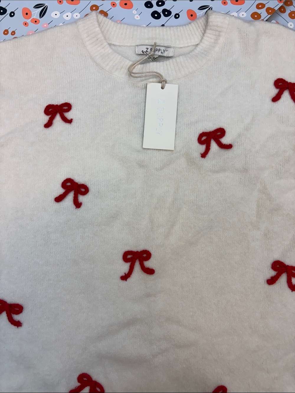 Z Supply Cream Pullover with Red Bow Accents